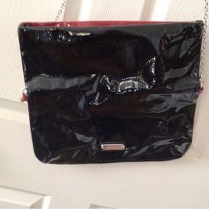 Fold up bag red one side black other patent leather